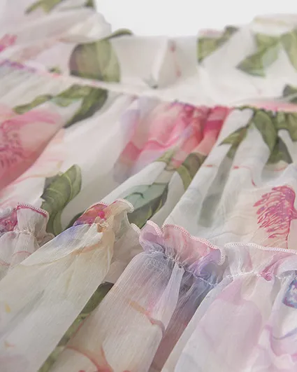 Abito corto senza maniche in fantasia floreale rosa e verde con balza 4-7 anni