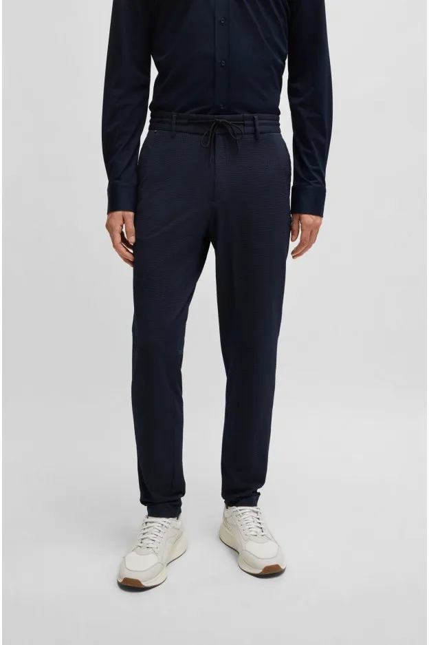 Boss - Hugo Boss Boss - Hugo Boss pantaloni slim fit in seersucker elasticizzato ad alte prestazioni