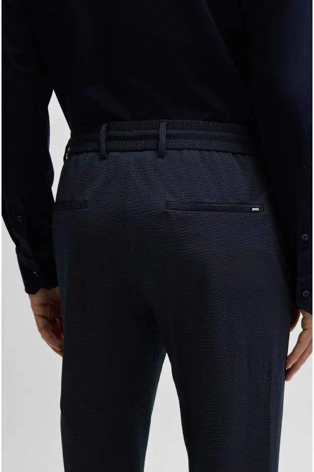 Boss - Hugo Boss Boss - Hugo Boss pantaloni slim fit in seersucker elasticizzato ad alte prestazioni