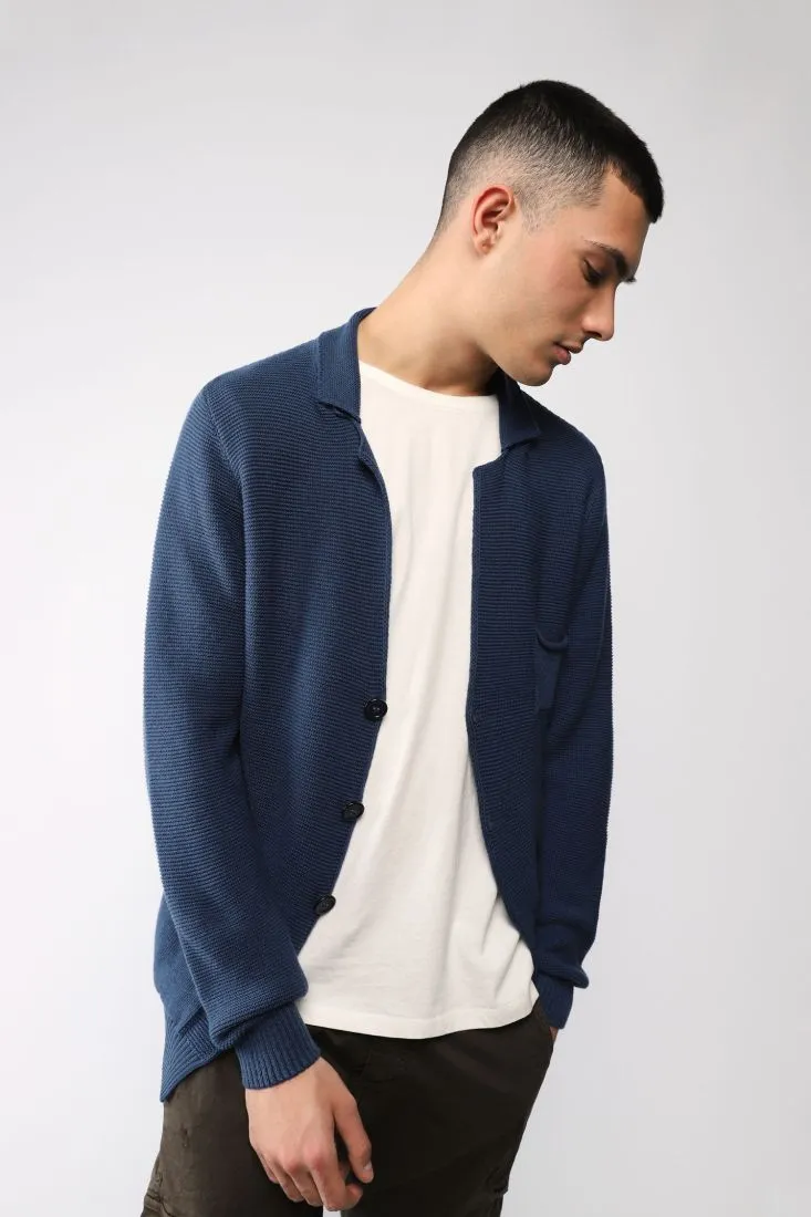 Cardigan monocolour con abbottonatura e tasche applicate