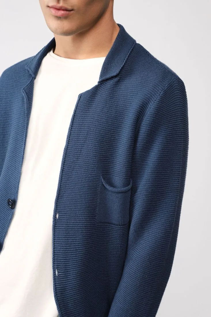 Cardigan monocolour con abbottonatura e tasche applicate