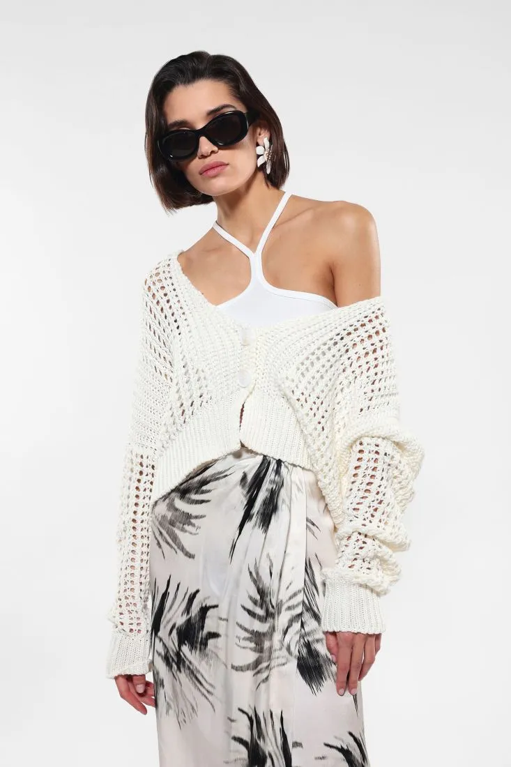 Cardigan oversize cropped traforato con bottoni