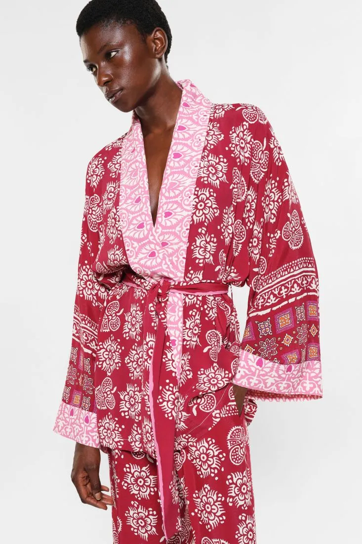 Cardigan oversize fantasia floreale con fusciacca