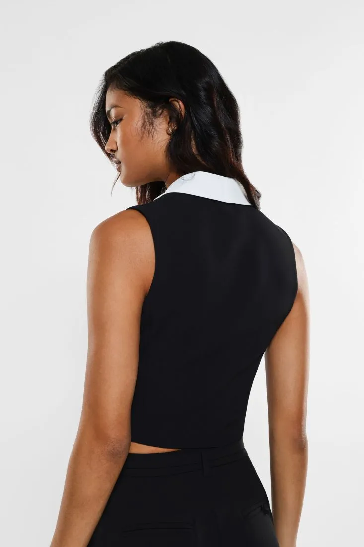 Gilet con revers a contrasto