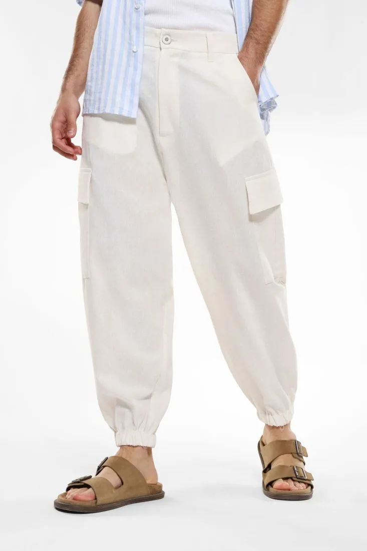 Pantaloni cargo con tasche verticali e orlo inferiore elasticizzato